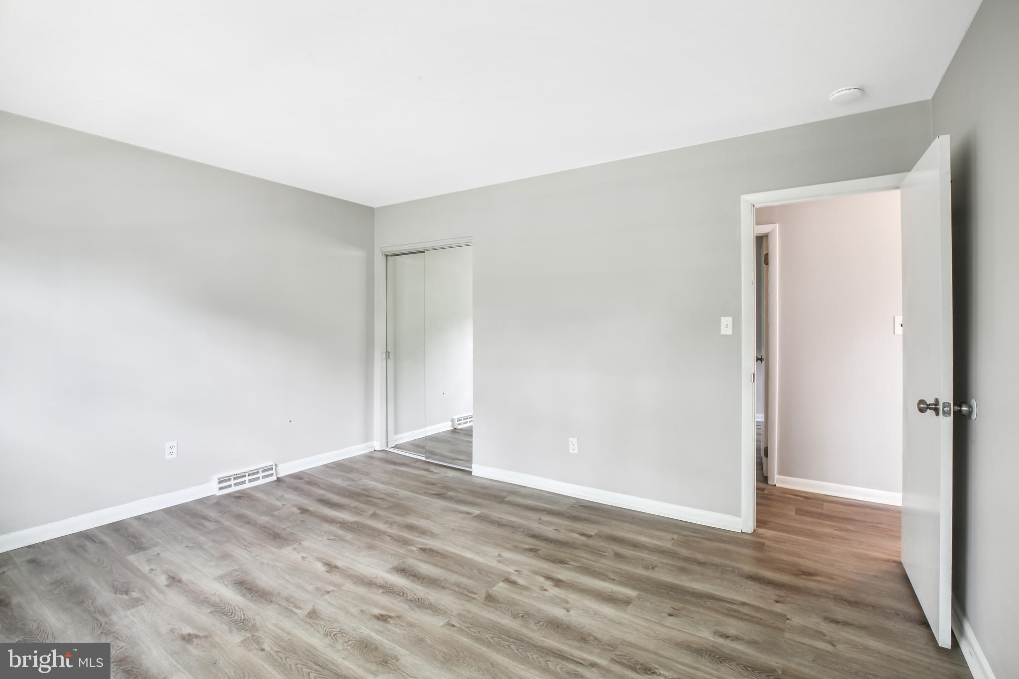 430 Richey Avenue, Unit 2B Oaklyn, NJ 08107 - Photo 8 of 15 Front bedroom and closet with mirror doors