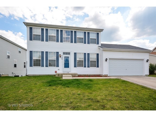 729 Periwinkle Lane Aurora, IL 60504 - Photo 1 of 15 a big house with a big yard and more windows