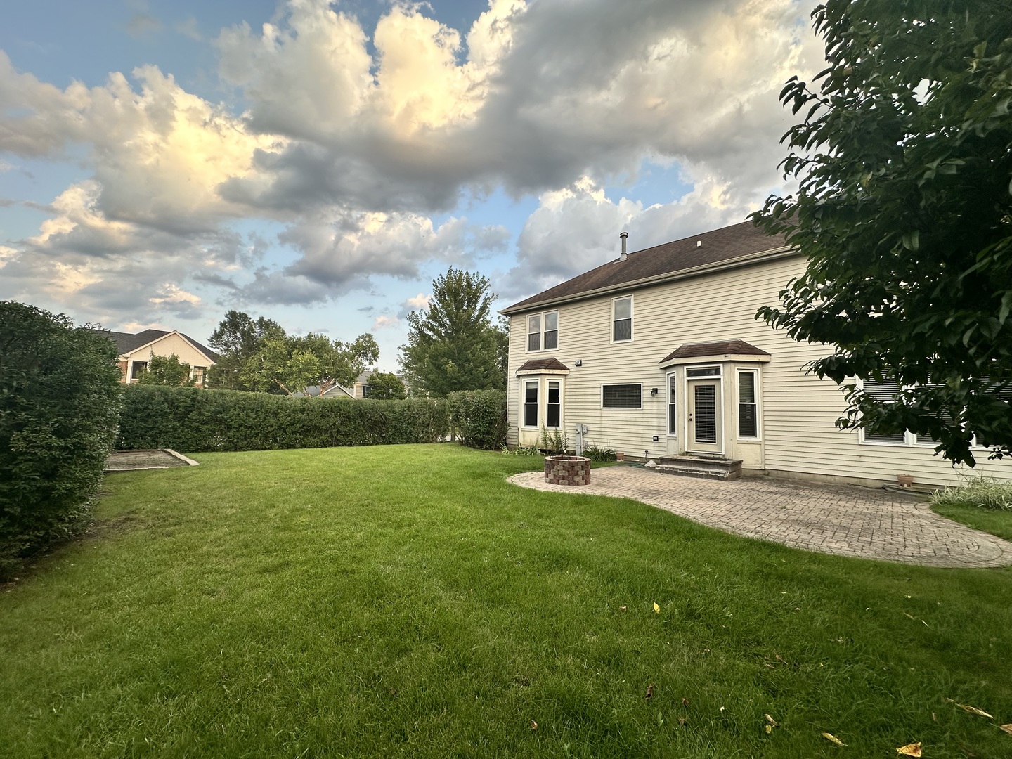 1592 Wakefield Court Mundelein, IL 60060 - Photo 24 of 25 a view of a house with a yard