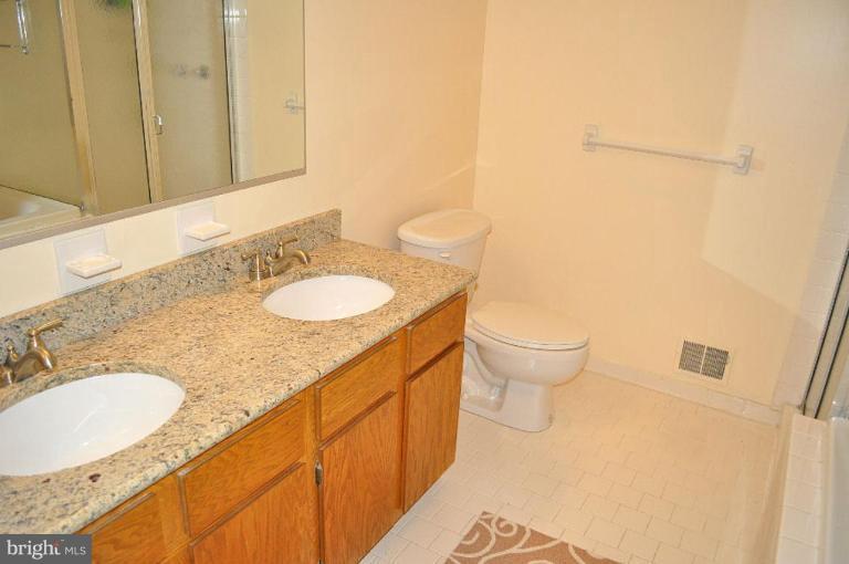 12101 Gold Ribbon Way Columbia, MD 21044 - Photo 26 of 29 Master Bath features dual vanities with granite