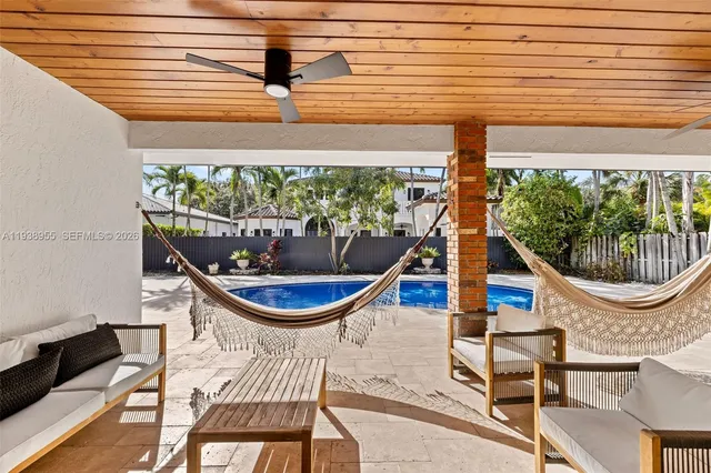 a blue white and black glass top table and chairs