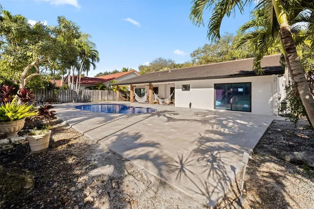 a house with trees in front of it