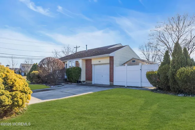a view of a house with a back yard