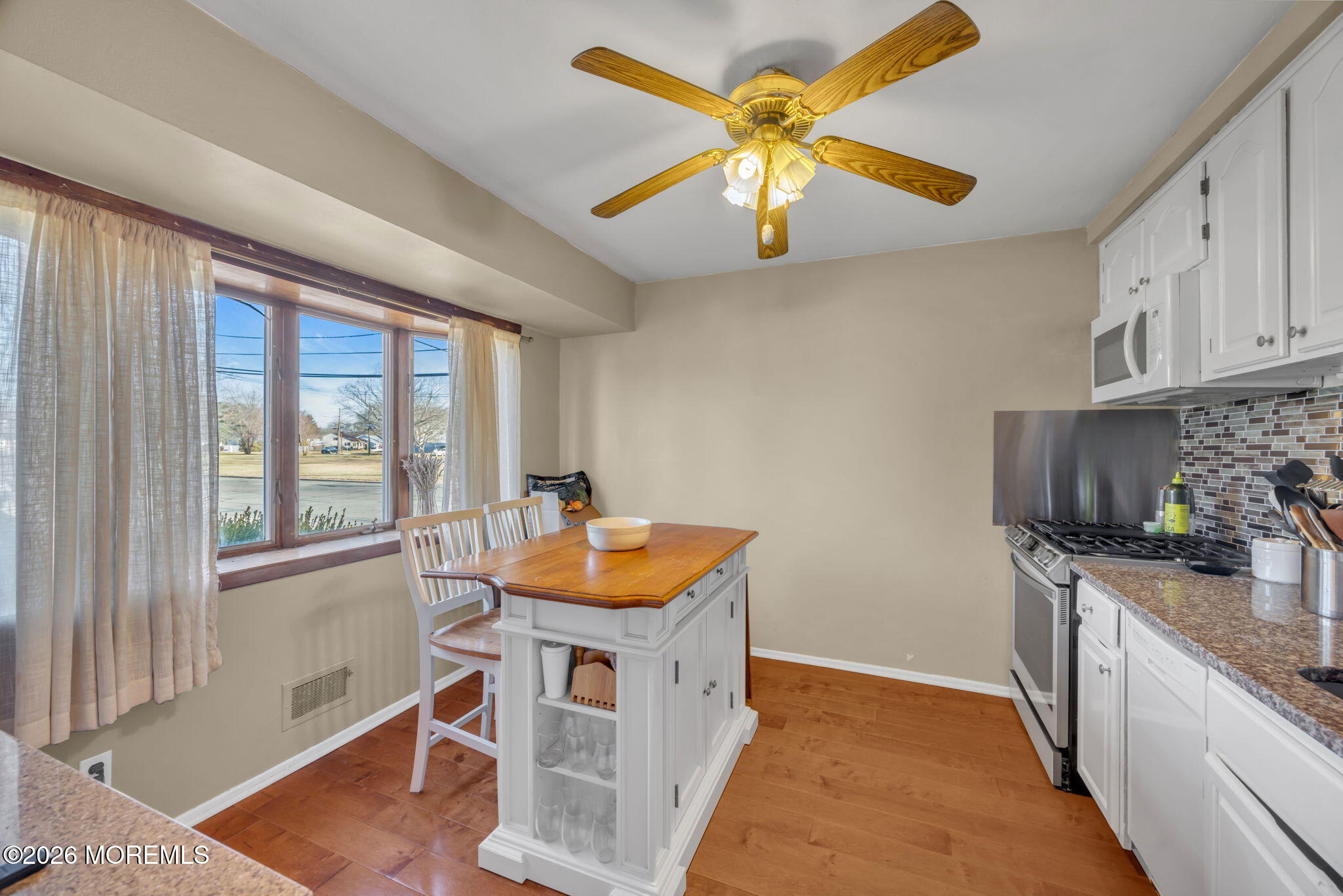 68 Sunnybrae Boulevard Hamilton, NJ 08620 - Photo 14 of 35 a kitchen with stainless steel appliances granite countertop a sink and a refrigerator
