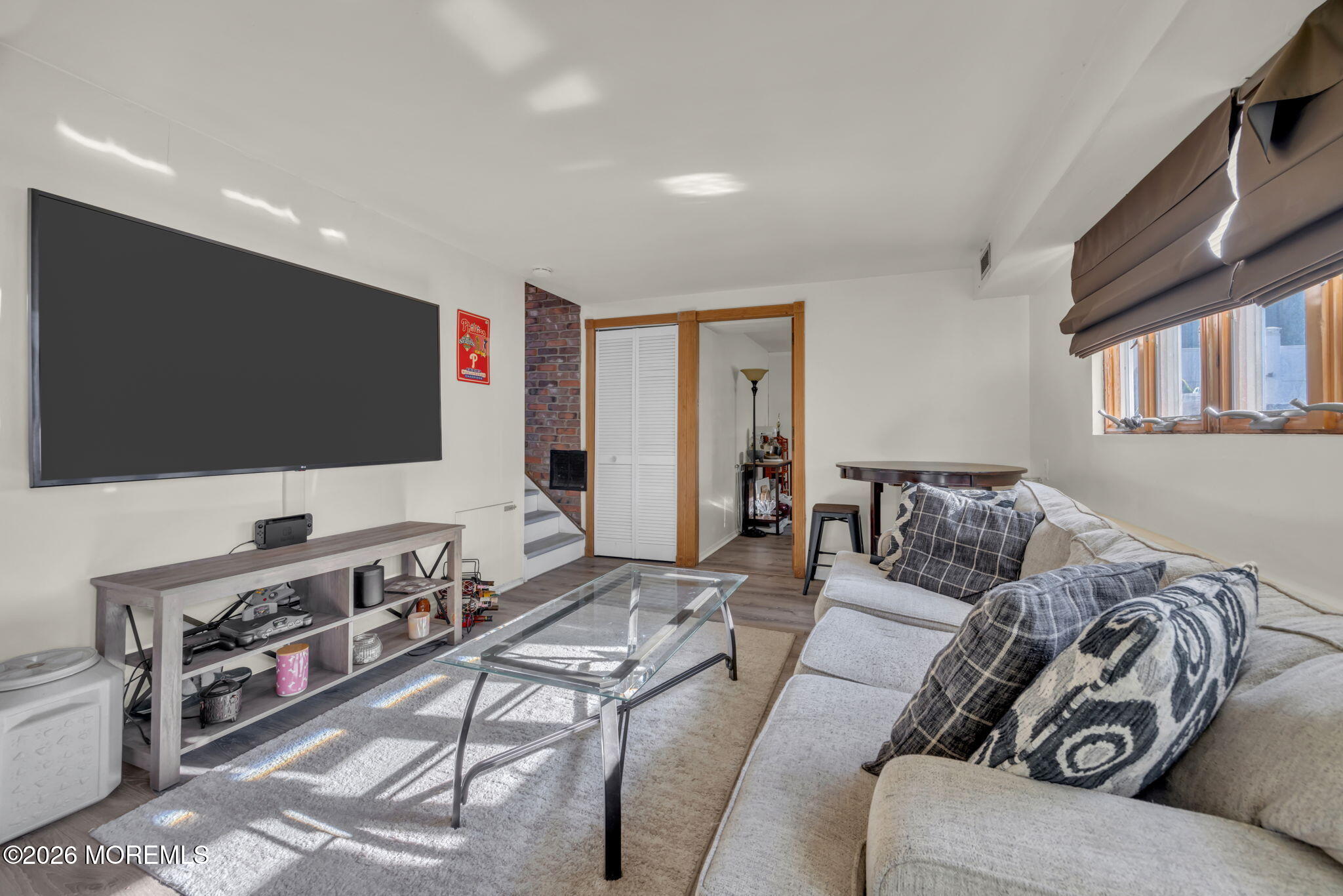 68 Sunnybrae Boulevard Hamilton, NJ 08620 - Photo 17 of 35 a living room with furniture and a flat screen tv
