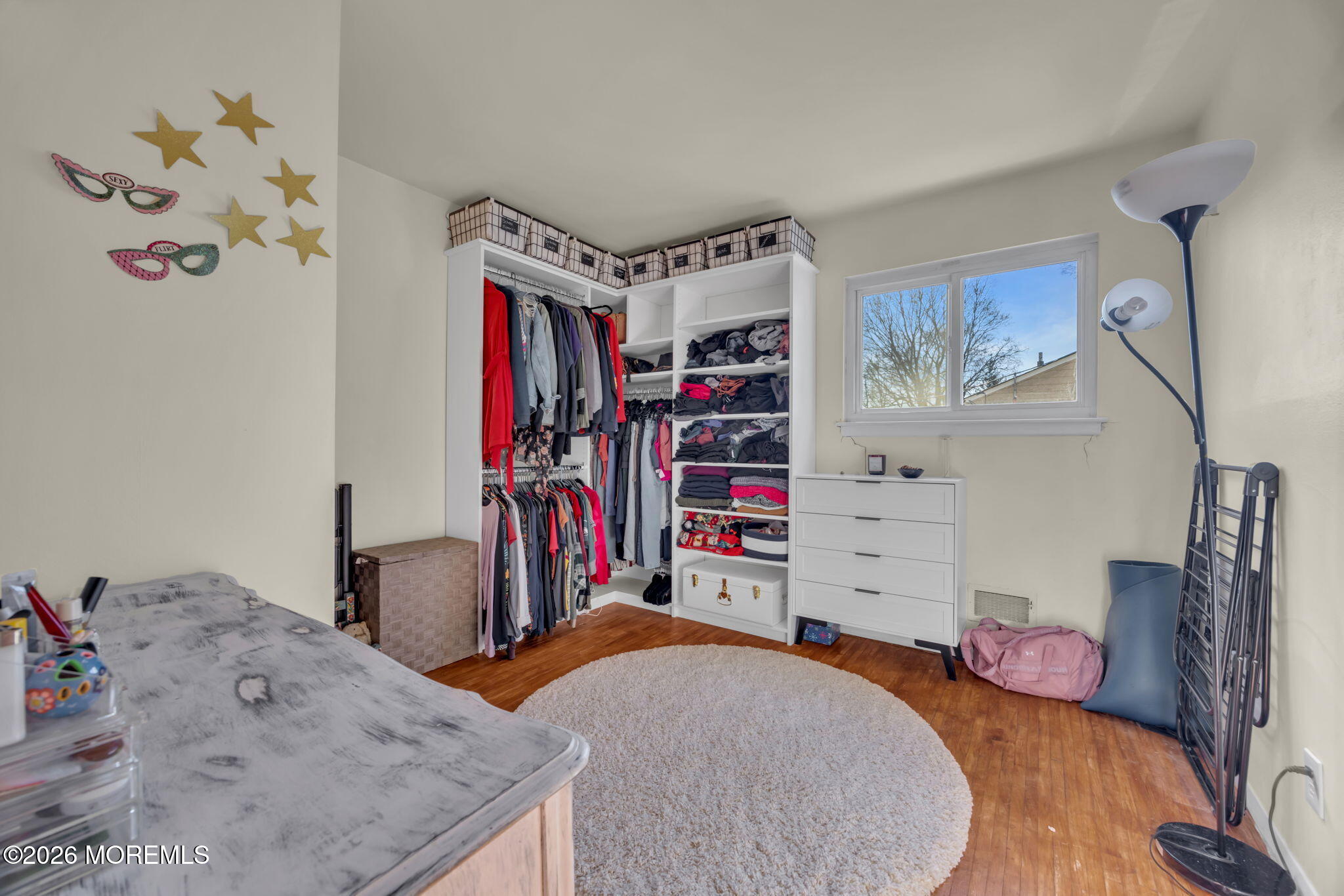 68 Sunnybrae Boulevard Hamilton, NJ 08620 - Photo 23 of 35 a bedroom with a bed and a chandelier