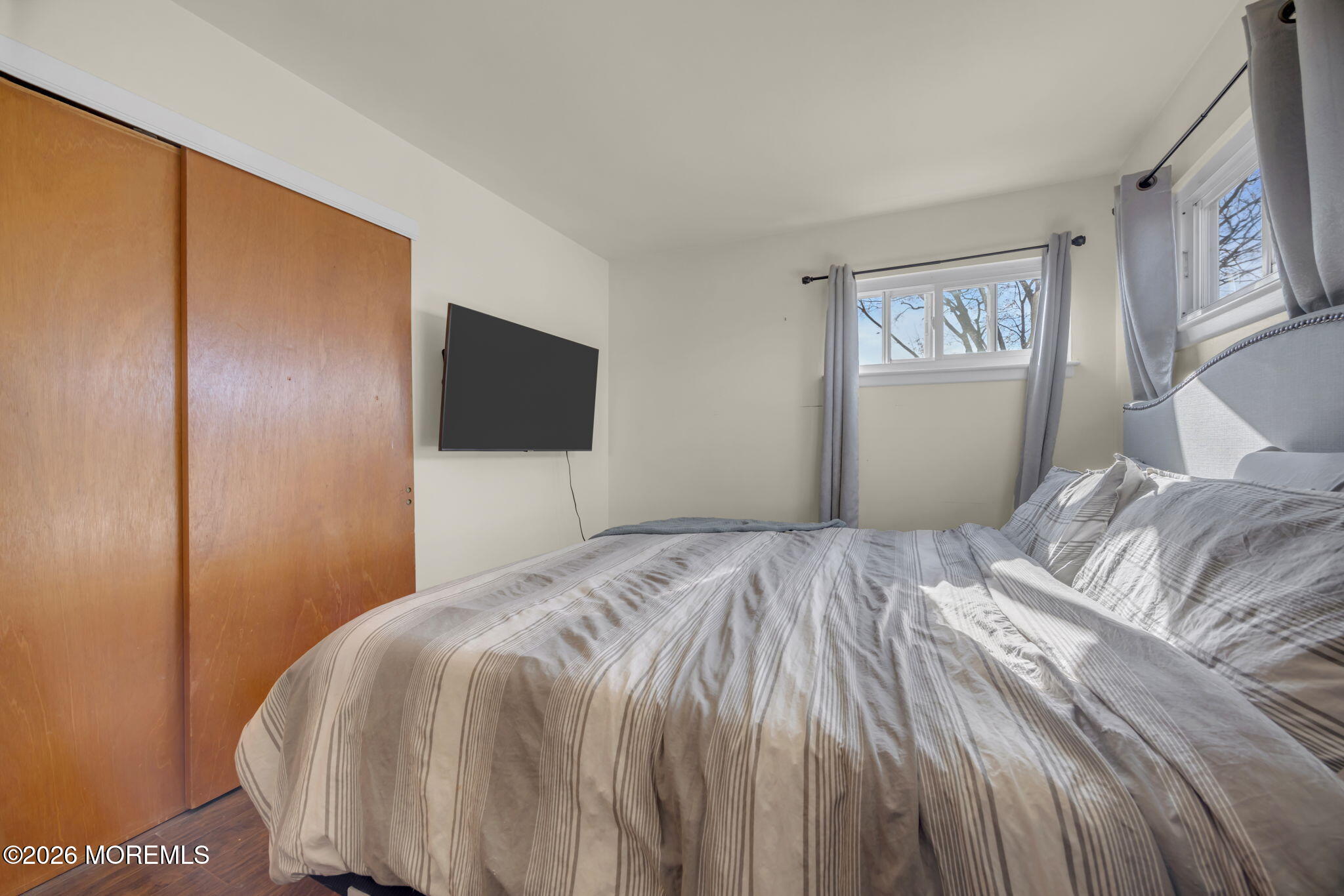 68 Sunnybrae Boulevard Hamilton, NJ 08620 - Photo 26 of 35 a bedroom with a bed and a flat screen tv