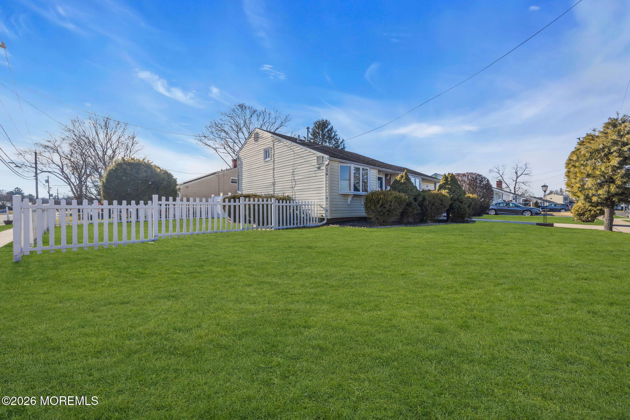 68 Sunnybrae Boulevard Hamilton, NJ 08620 - Photo 5 of 35 a view of a house with a big yard potted plants and large tree
