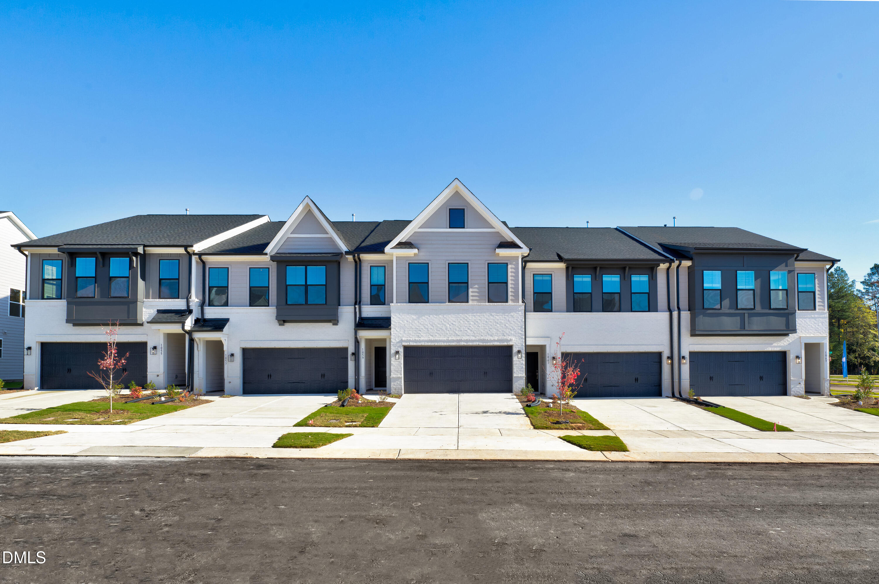 929 Westerland Way, Unit 75 Durham, NC 27703 - Photo 5 of 7 a view of swimming pool with large trees next to a road
