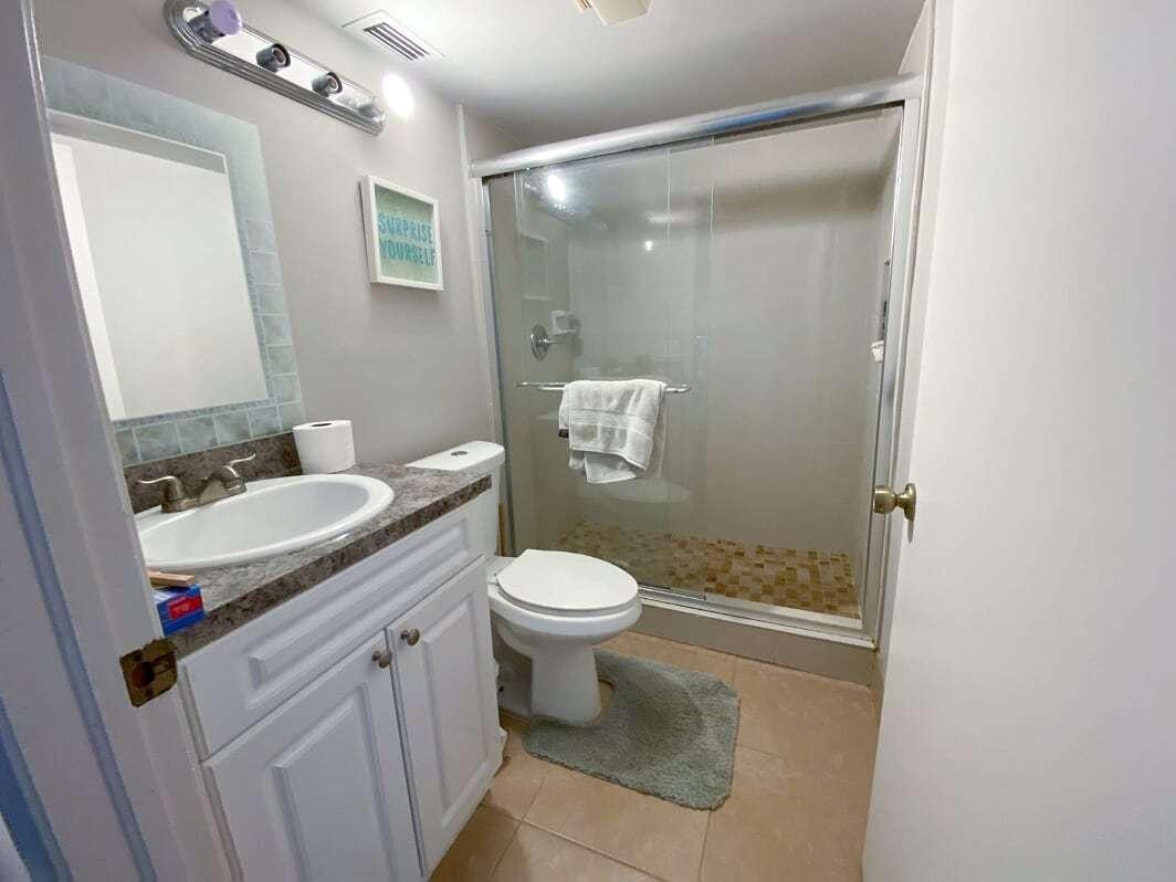 8361 Trent Court, Unit A Boca Raton, FL 33433 - Photo 8 of 13 Townhouse guest bathroom