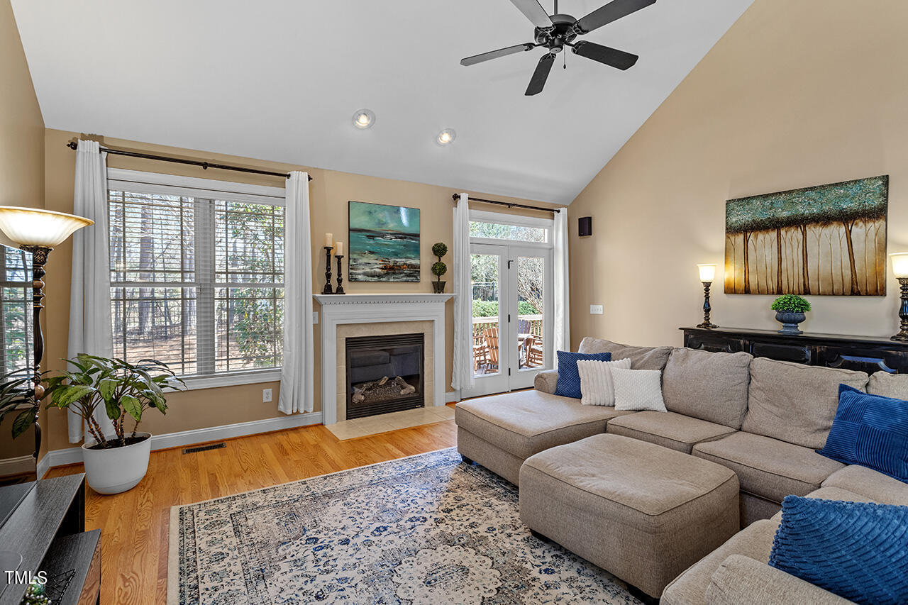 102 Juliet Circle Cary, NC 27513 - Photo 11 of 42 a living room with furniture and a fireplace