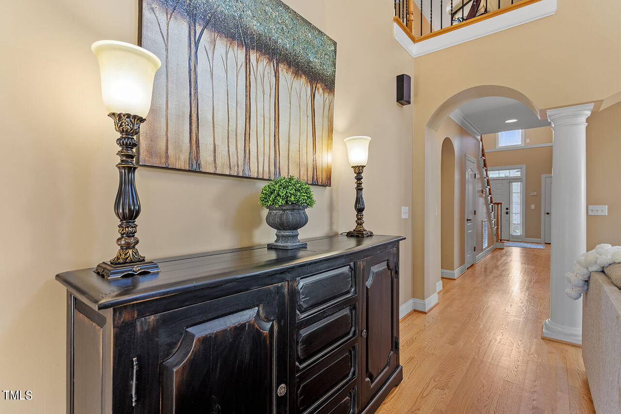 102 Juliet Circle Cary, NC 27513 - Photo 13 of 42 a view of hall way with furniture and wooden floor