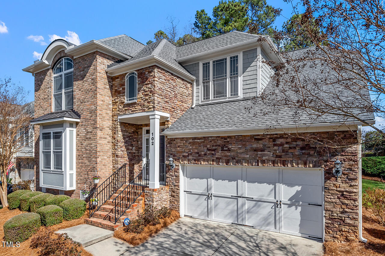 102 Juliet Circle Cary, NC 27513 - Photo 2 of 42 front view of a house with a small yard
