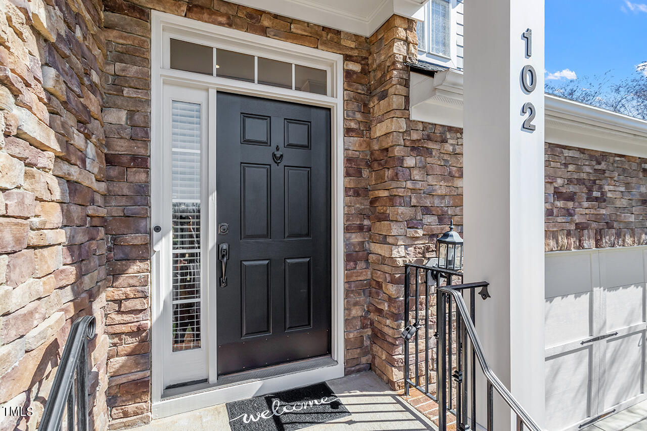 102 Juliet Circle Cary, NC 27513 - Photo 3 of 42 a view of a wooden door of the house