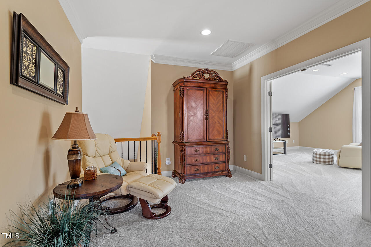102 Juliet Circle Cary, NC 27513 - Photo 35 of 42 a living room with furniture and a window