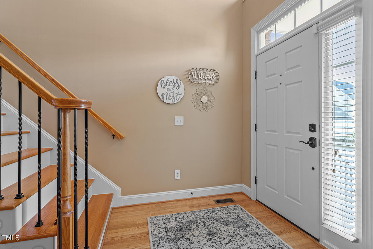 102 Juliet Circle Cary, NC 27513 - Photo 4 of 42 a view of an entryway with staircase