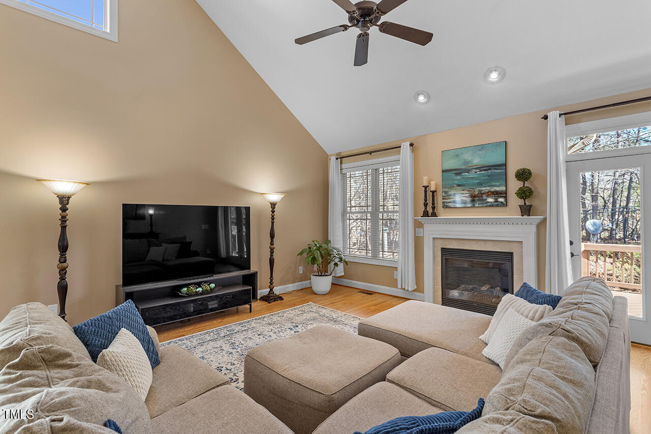102 Juliet Circle Cary, NC 27513 - Photo 8 of 42 a living room with furniture and a flat screen tv
