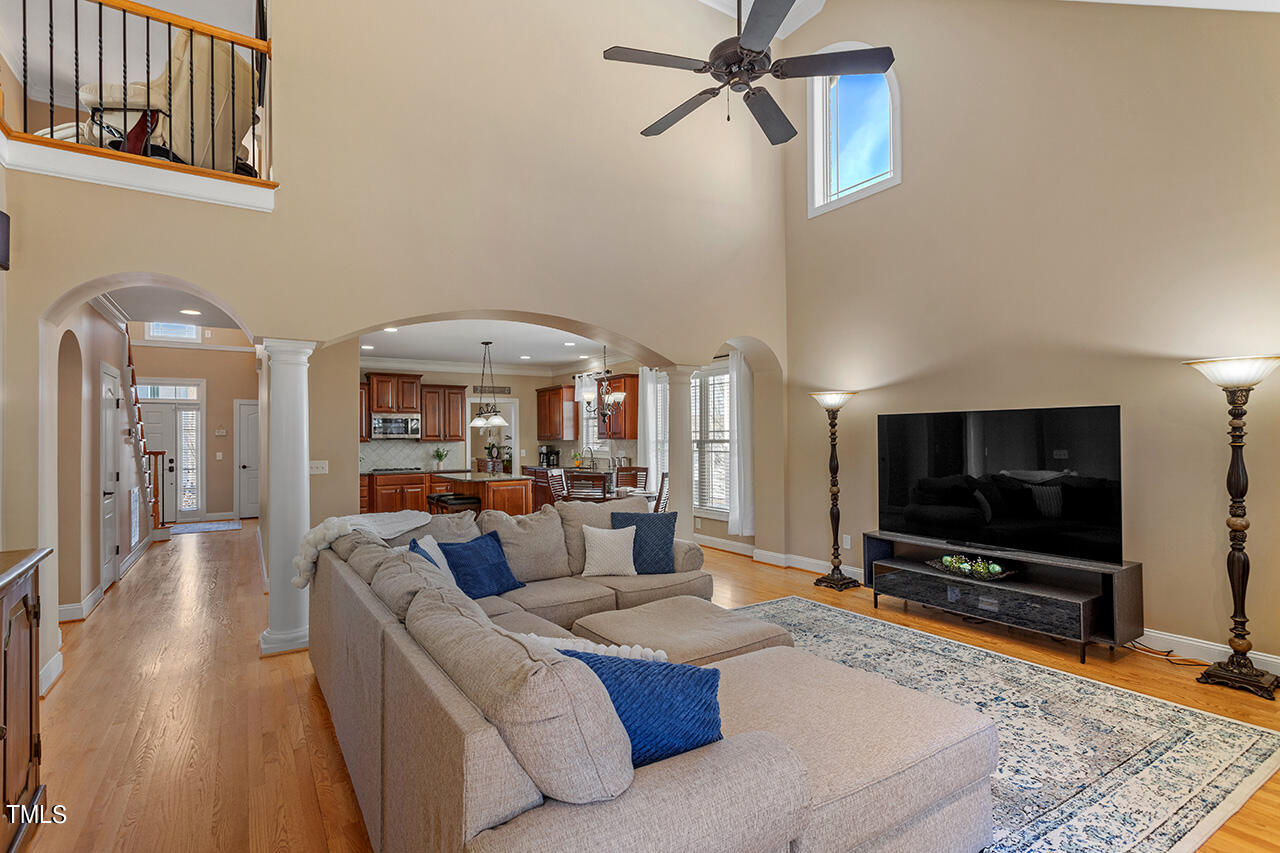 102 Juliet Circle Cary, NC 27513 - Photo 9 of 42 a living room with furniture and a flat screen tv