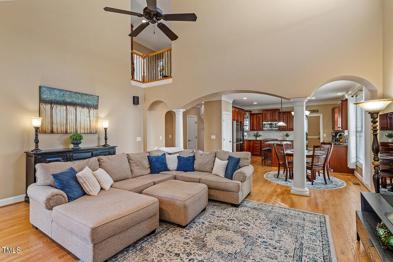 102 Juliet Circle Cary, NC 27513 - Photo 10 of 42 a living room with furniture and a view of kitchen