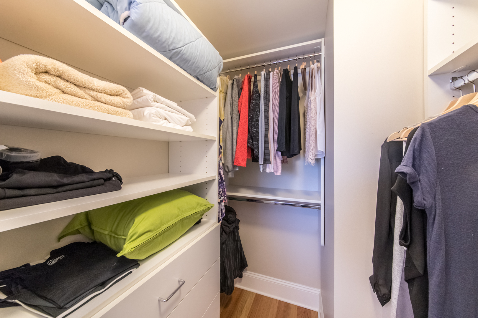 4306 North Clark Street, Unit 2 Chicago, IL 60613 - Photo 16 of 25 a view of walk in closet with clothes and shoes