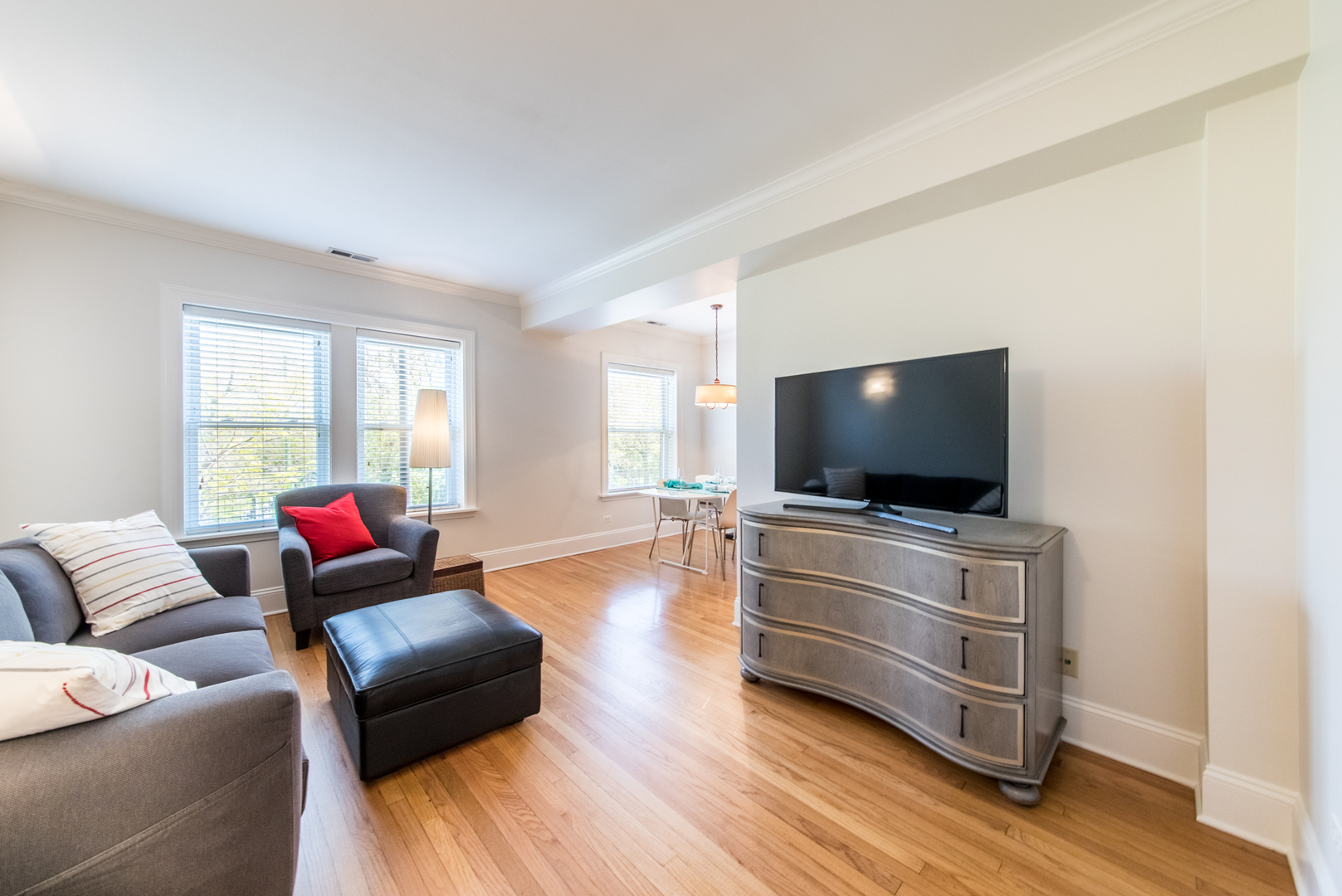 4306 North Clark Street, Unit 2 Chicago, IL 60613 - Photo 4 of 25 a living room with furniture and a flat screen tv