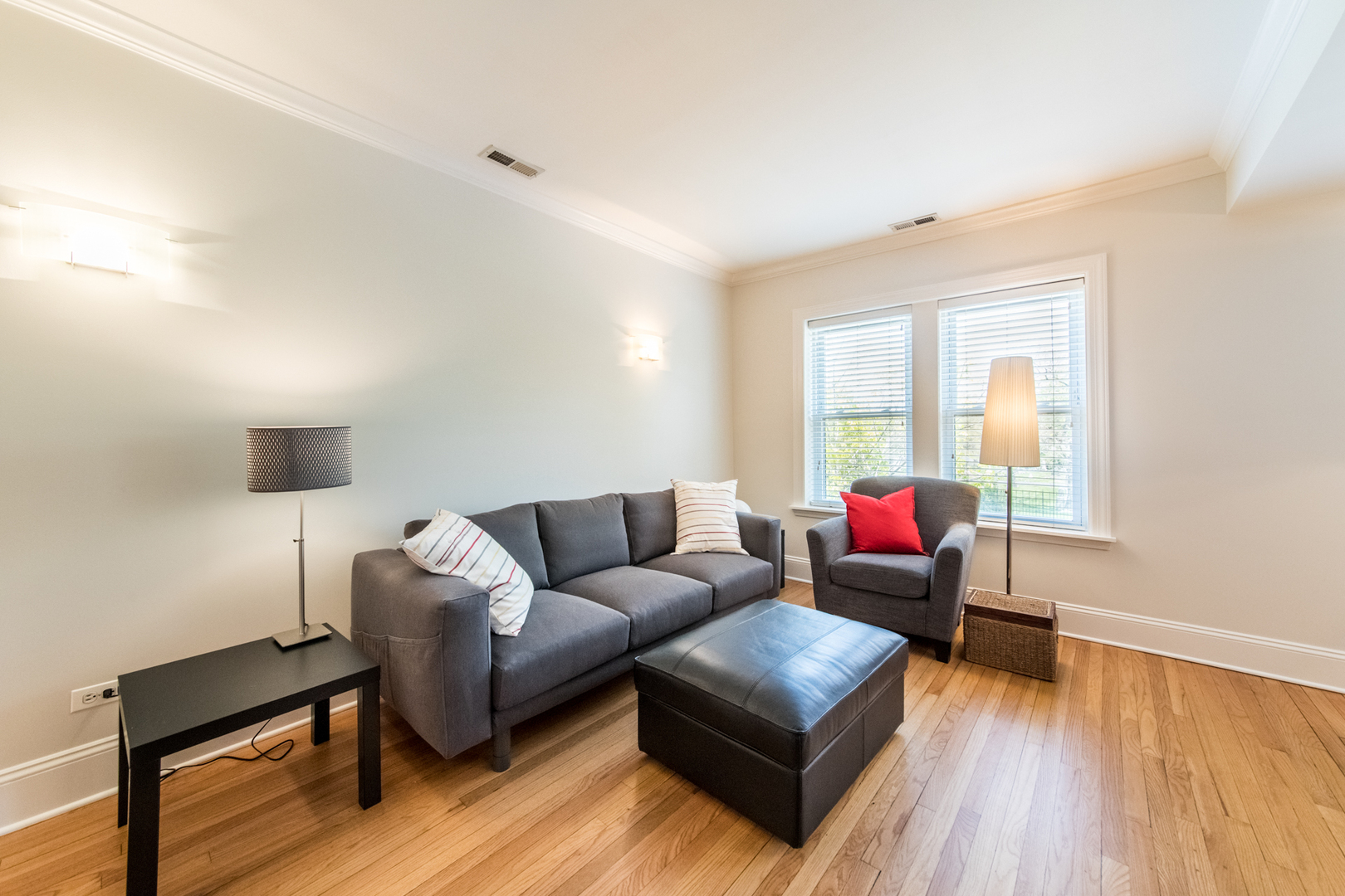 4306 North Clark Street, Unit 2 Chicago, IL 60613 - Photo 5 of 25 a living room with furniture and a wooden floor