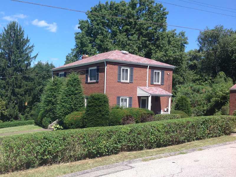 6512 Verona Road Penn Hills, PA 15147 - Photo 1 of 25 Exterior Front. SIDE DOOR with COVERED PORCH, BRICK GARAGE TO THE RIGHT.