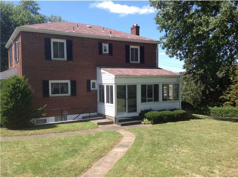 6512 Verona Road Penn Hills, PA 15147 - Photo 17 of 25 Exterior Back. THREE-SEASON PORCH IS A PLEASURE