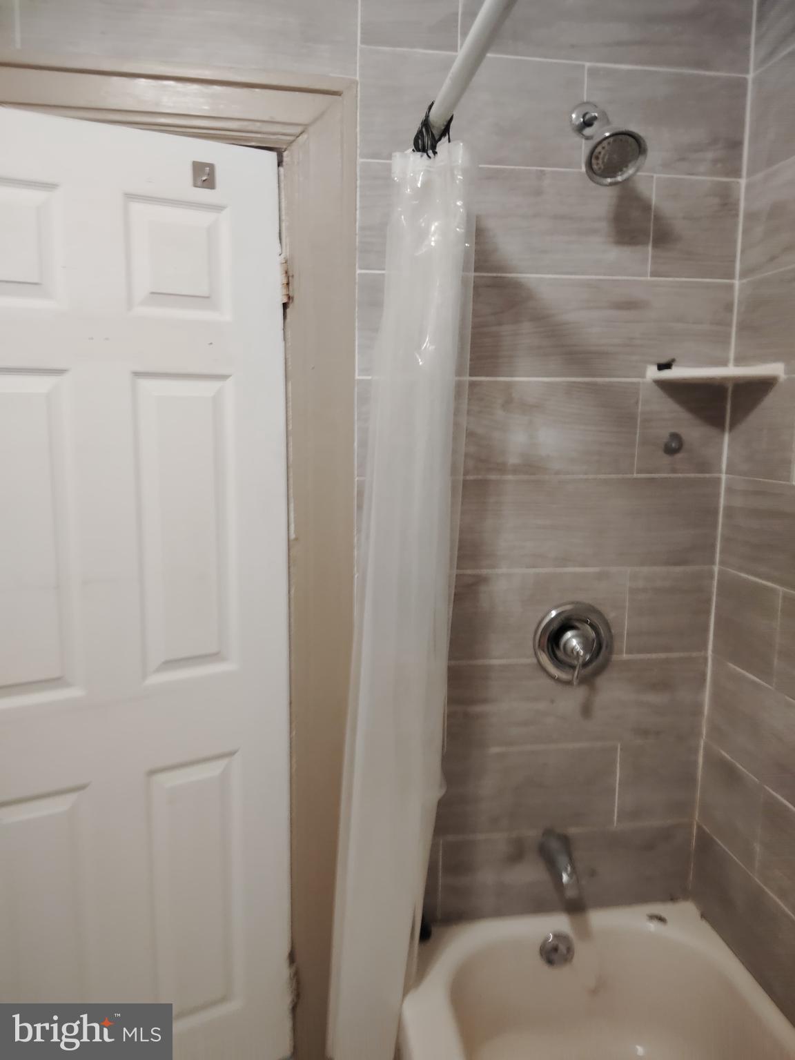 4514 Walnut Street Philadelphia, PA 19139 - Photo 10 of 10 a bathroom with a shower