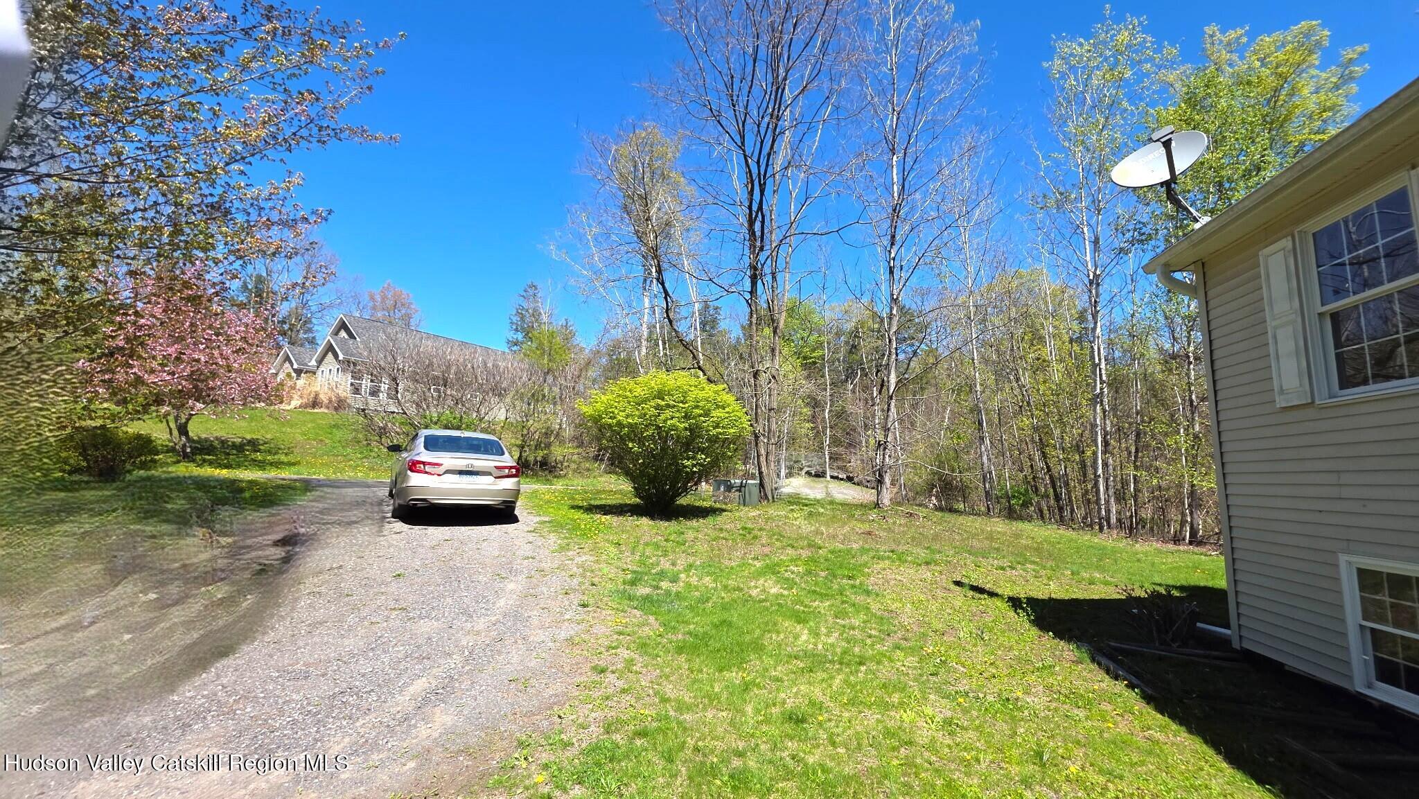 10 Lena Lane Cairo, NY 12413 - Photo 19 of 19 a view of a house with backyard and sitting area
