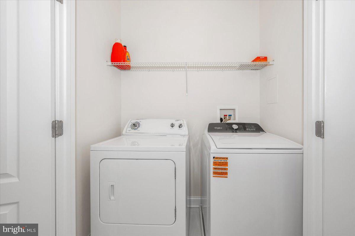 741 Appalachian Way Brunswick, MD 21716 - Photo 18 of 44 a utility room with dryer and washer