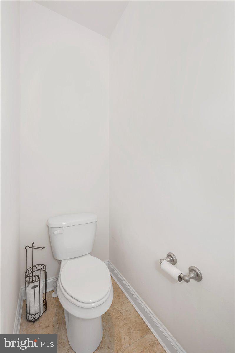 741 Appalachian Way Brunswick, MD 21716 - Photo 23 of 44 a white toilet sitting next to a white wall