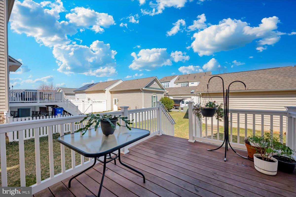 741 Appalachian Way Brunswick, MD 21716 - Photo 36 of 44 a view of a balcony with chairs