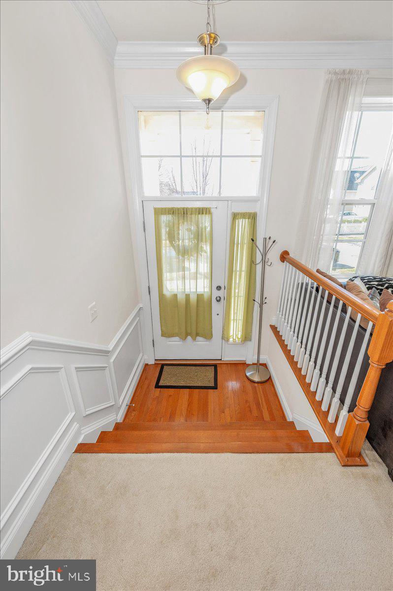 741 Appalachian Way Brunswick, MD 21716 - Photo 7 of 44 a room with window and a chandelier