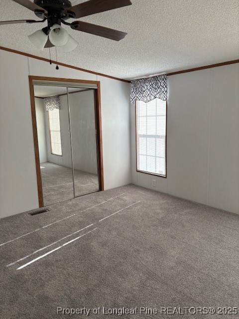 460 Shelton Beard Road Stedman, NC 28391 - Photo 18 of 27 an empty room with windows and closet