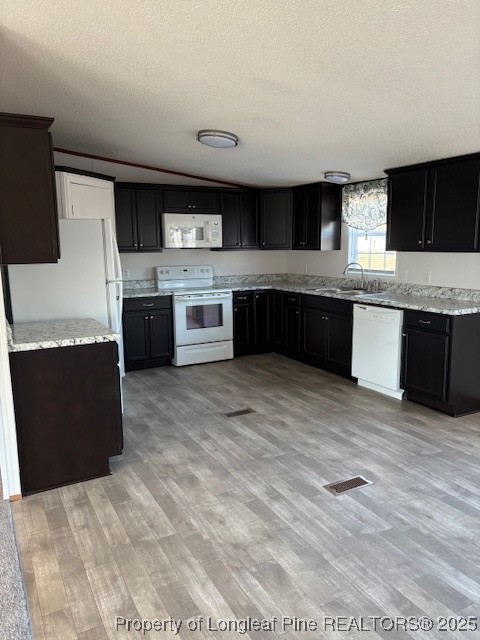 460 Shelton Beard Road Stedman, NC 28391 - Photo 4 of 27 a large kitchen with stainless steel appliances granite countertop a stove a sink dishwasher and a refrigerator