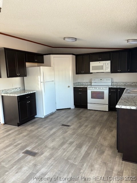 460 Shelton Beard Road Stedman, NC 28391 - Photo 5 of 27 a kitchen with stainless steel appliances a stove and a refrigerator
