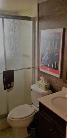 a bathroom with a toilet and a sink