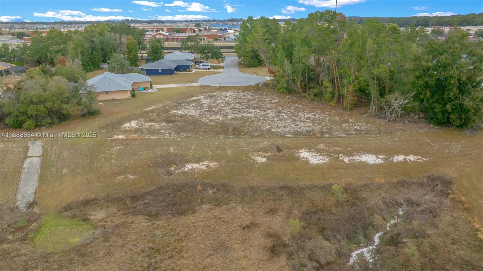 9559 Southwest 45th Court Ocala, FL 34476 - Photo 12 of 15 a view of a yard with patio