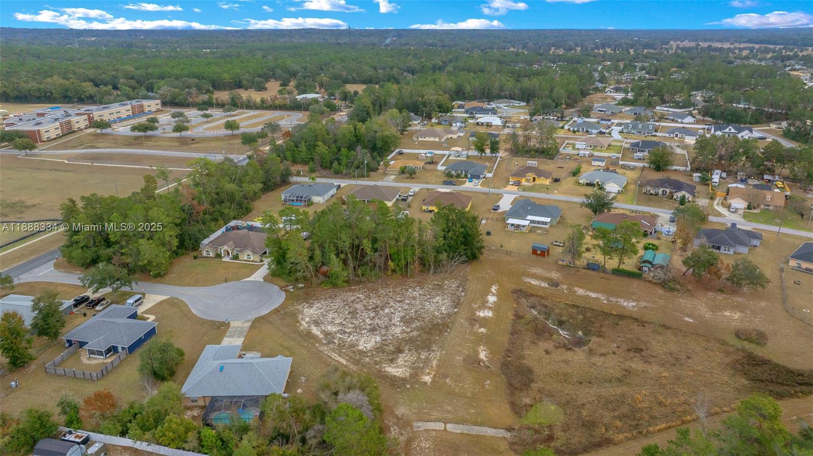 9559 Southwest 45th Court Ocala, FL 34476 - Photo 6 of 15 a view of a lake with outdoor space