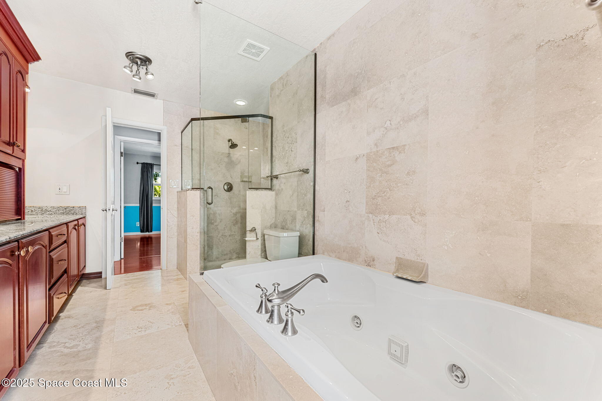 157 Cocoa Avenue Indialantic, FL 32903 - Photo 19 of 36 a bathroom with a bathtub and a shower