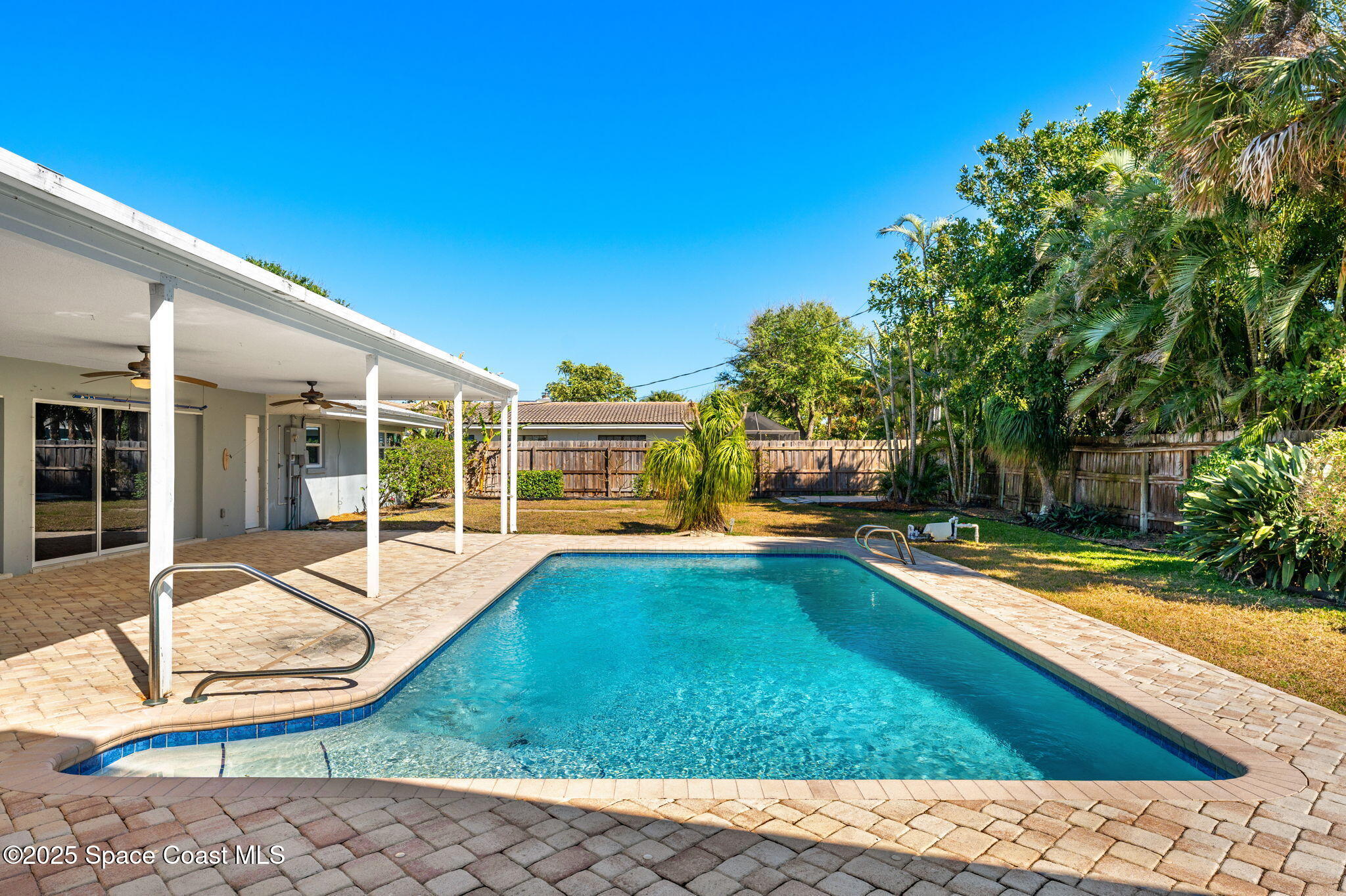 157 Cocoa Avenue Indialantic, FL 32903 - Photo 2 of 36 a view of a house with swimming pool and sitting area