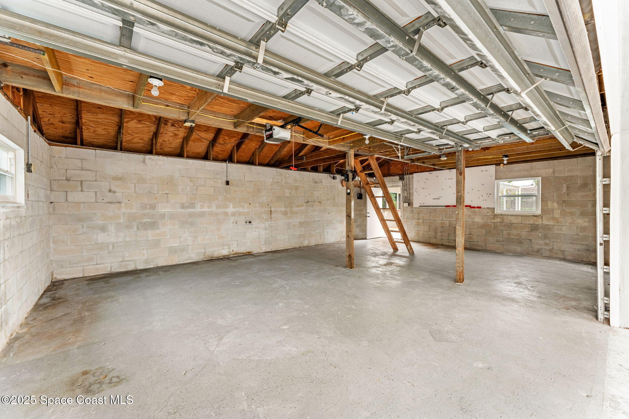 157 Cocoa Avenue Indialantic, FL 32903 - Photo 28 of 36 a view of a room with wooden walls