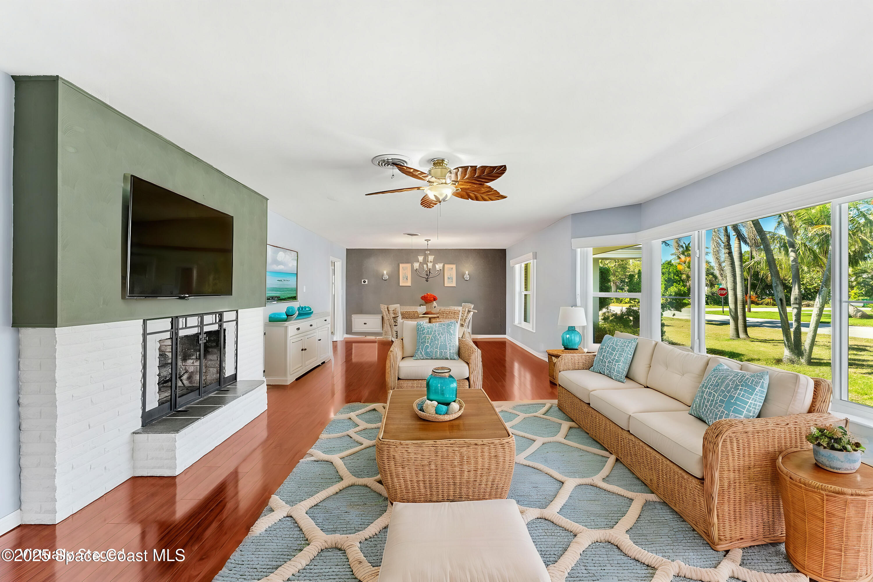 157 Cocoa Avenue Indialantic, FL 32903 - Photo 3 of 36 a living room with furniture and a flat screen tv