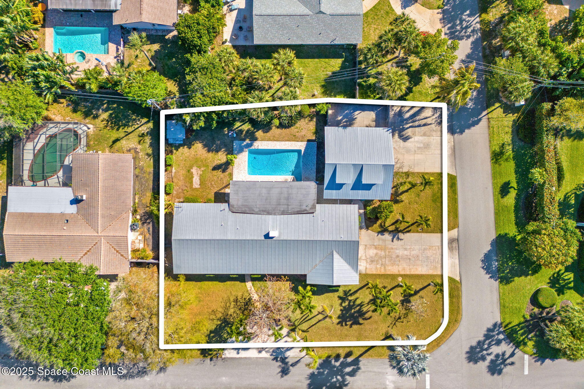 157 Cocoa Avenue Indialantic, FL 32903 - Photo 32 of 36 an aerial view of house with a swimming pool