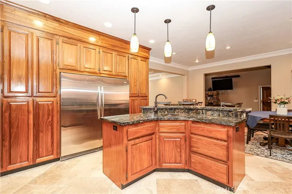 a living room with a fireplace and a flat screen tv