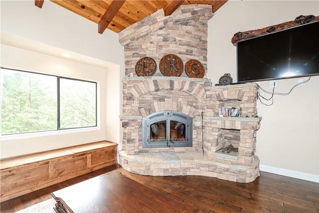 a bedroom with a bed and a ceiling fan