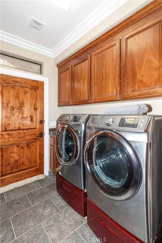 a bathroom with a granite countertop sink a toilet a mirror and shower