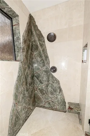 a view of a porch with a floor to ceiling window