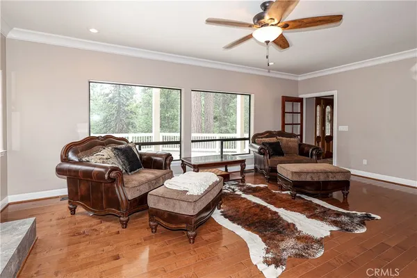 a bathroom with a granite countertop sink mirror and shower